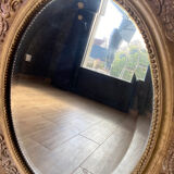 Old beveled oval mirror