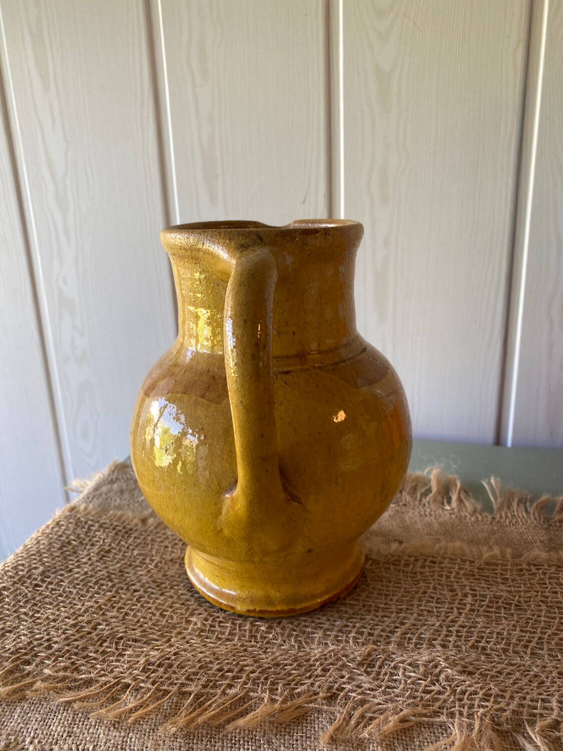 Yellow terracotta carafe