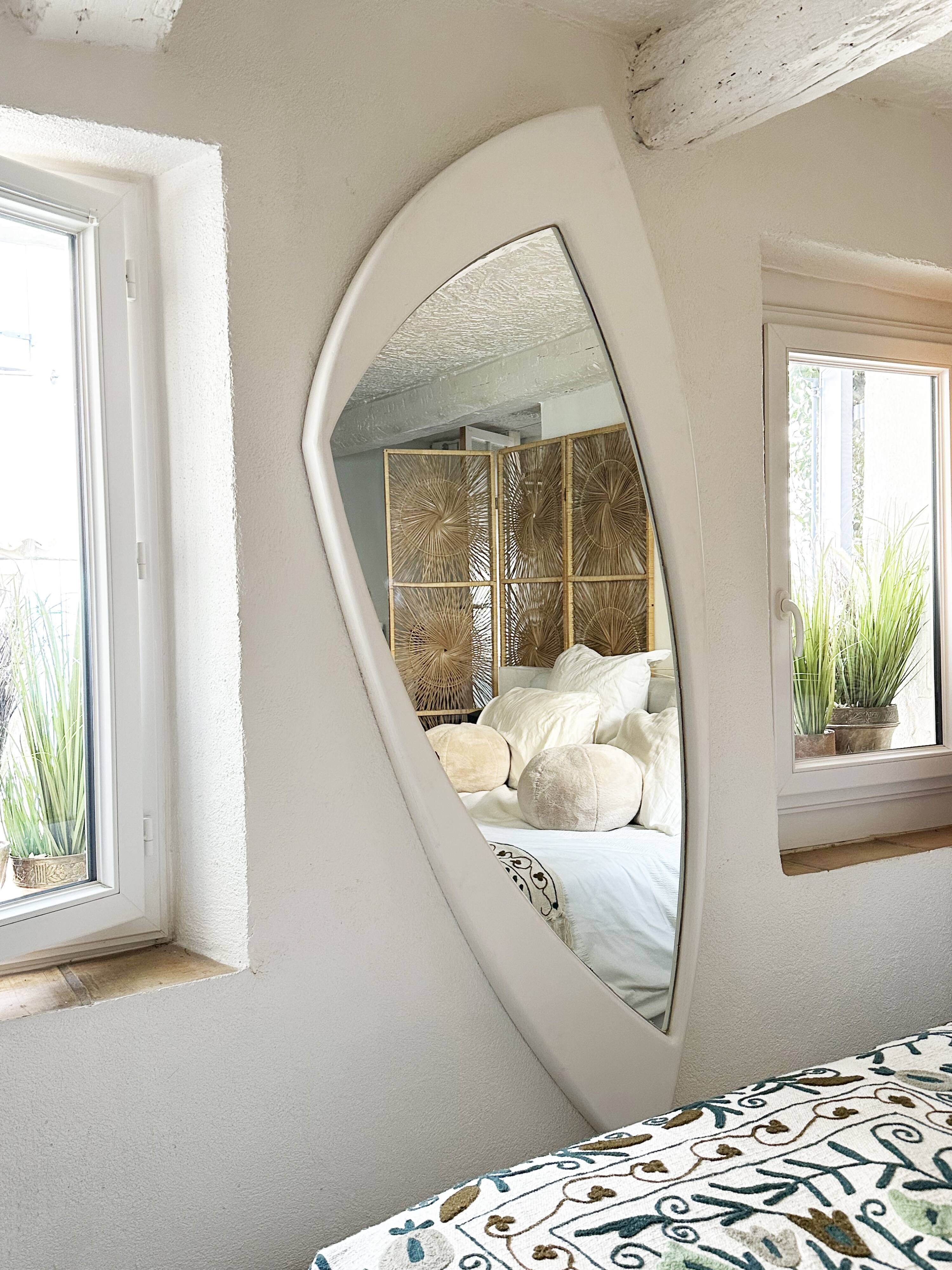 Dismantled Space Age XXL wall mirror in lacquered wood. France, 1970s.