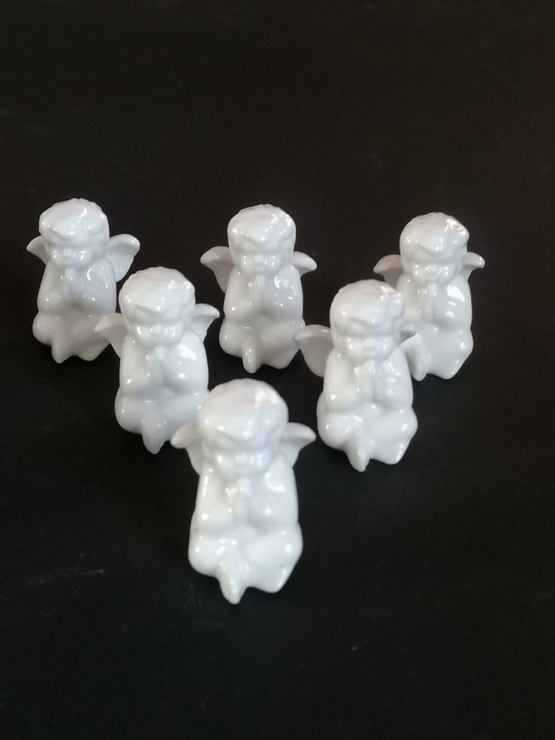 Lot 6 knife holders and 6 porcelain place markers putti angels