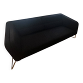 Black 3-seater sofa signed by a designer.