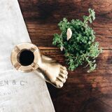 Solid brass ashtray in the shape of a foot