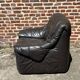 Pair of patinated leather club armchairs