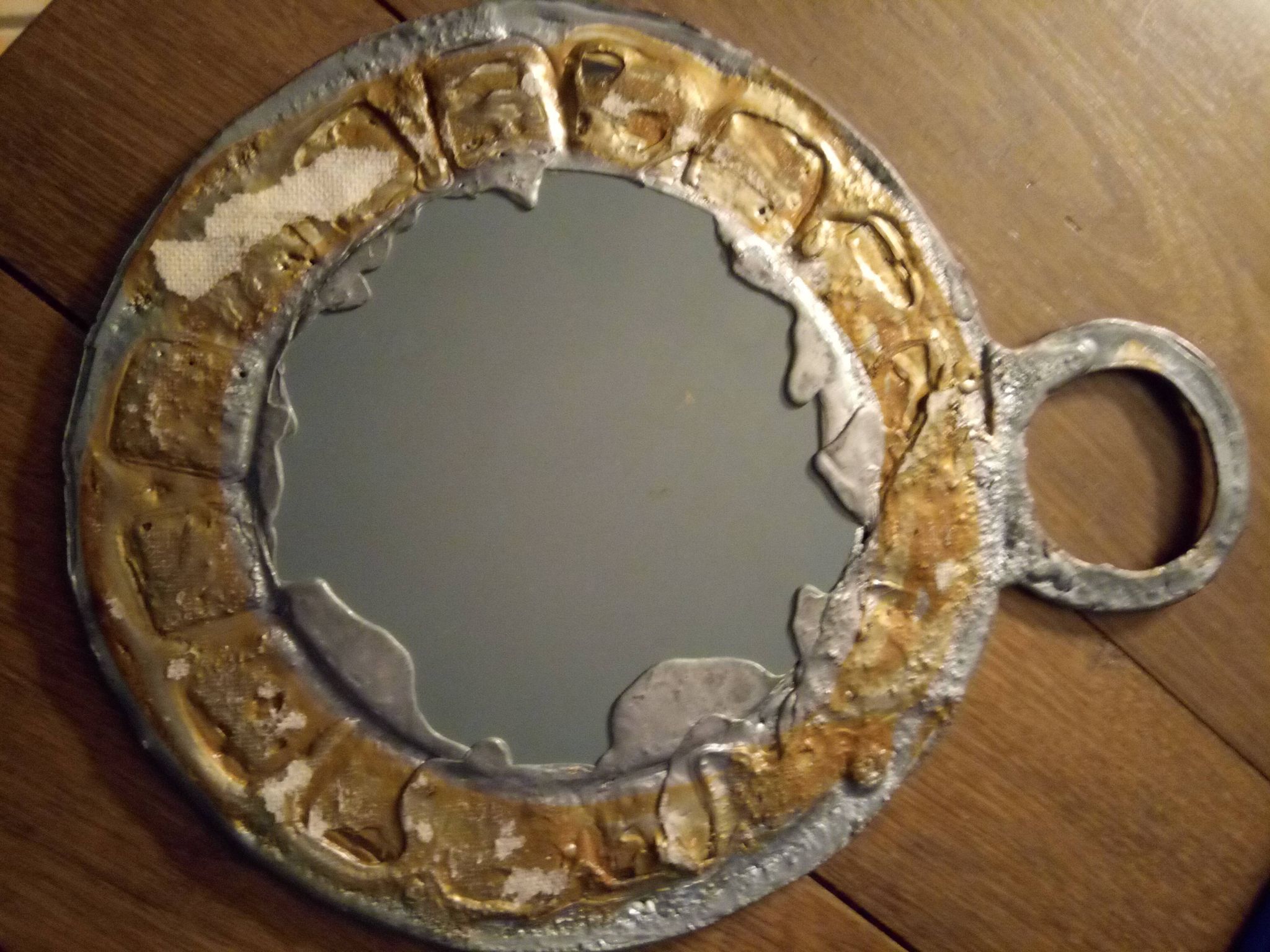 Lead and glass hand mirror
