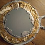 Lead and glass hand mirror