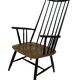 Vintage easy chair with high back and armrest from the 60s