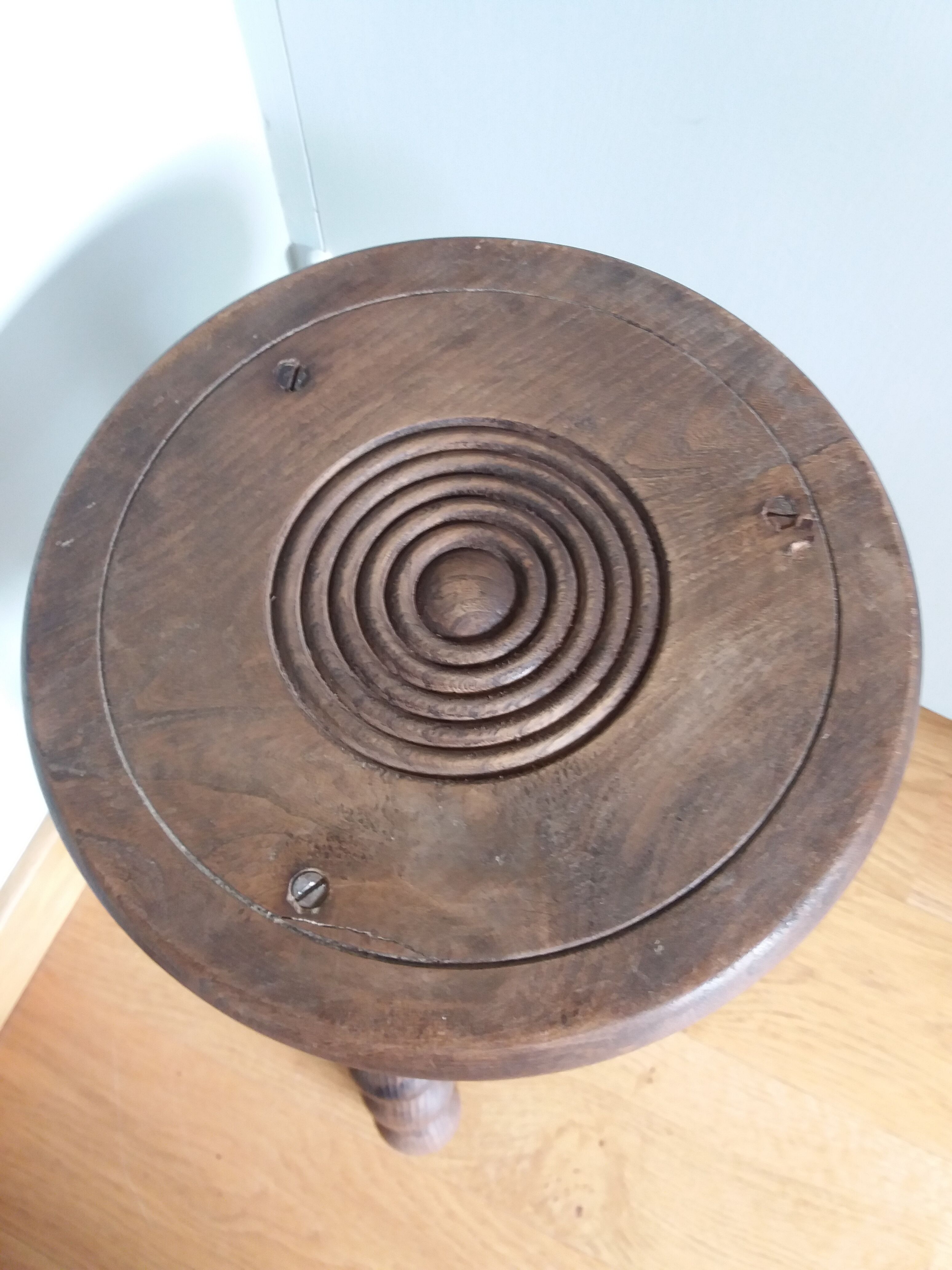 Tripod stool in wood turned coil way