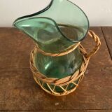 Glass pitcher and wicker