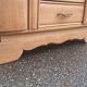 Art Deco buffet in raw oak wood.