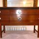 Avalon sideboard in brown teak veneer, chrome handles and wooden legs, 1960s.