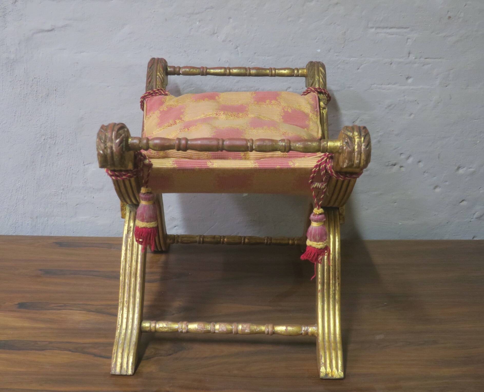 Antique parcel gilt cruciform stool