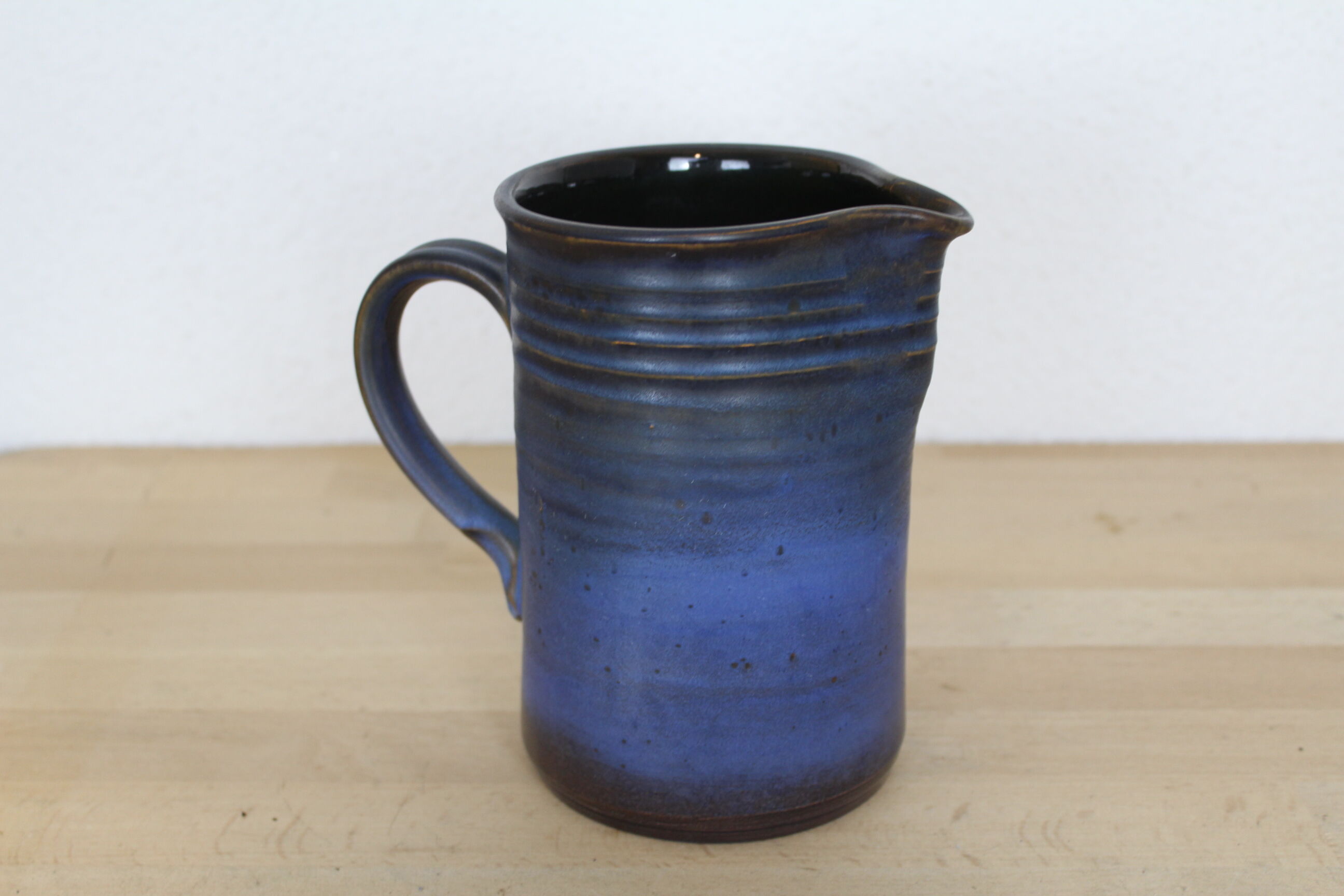 Blue ceramic pitcher, Ludovic Salins