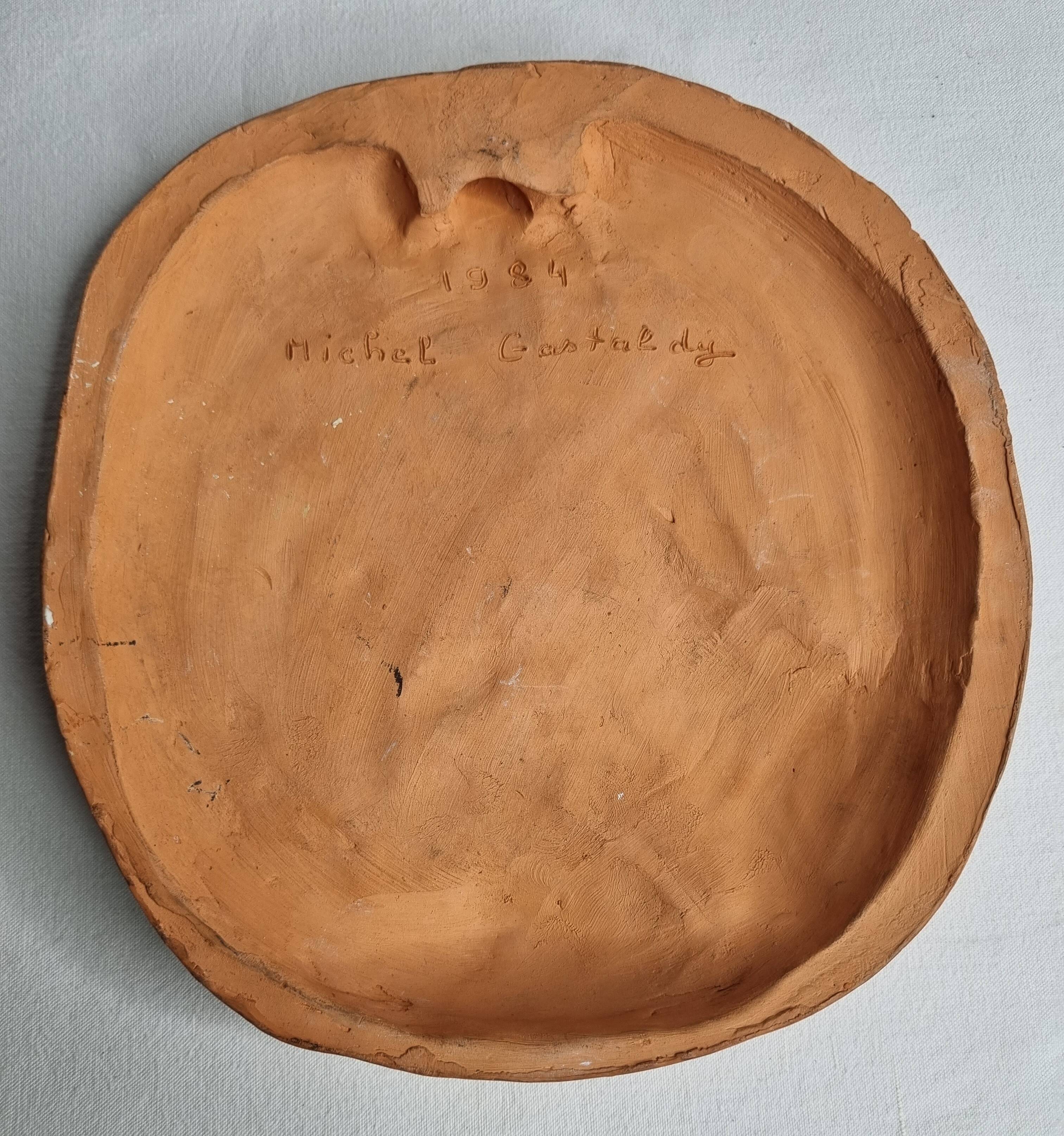 Bas-relief mural in terracotta, profile of a man, signed, 21 x 20 cm, 1984.