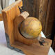 Pair of wooden bookends, rotating globes