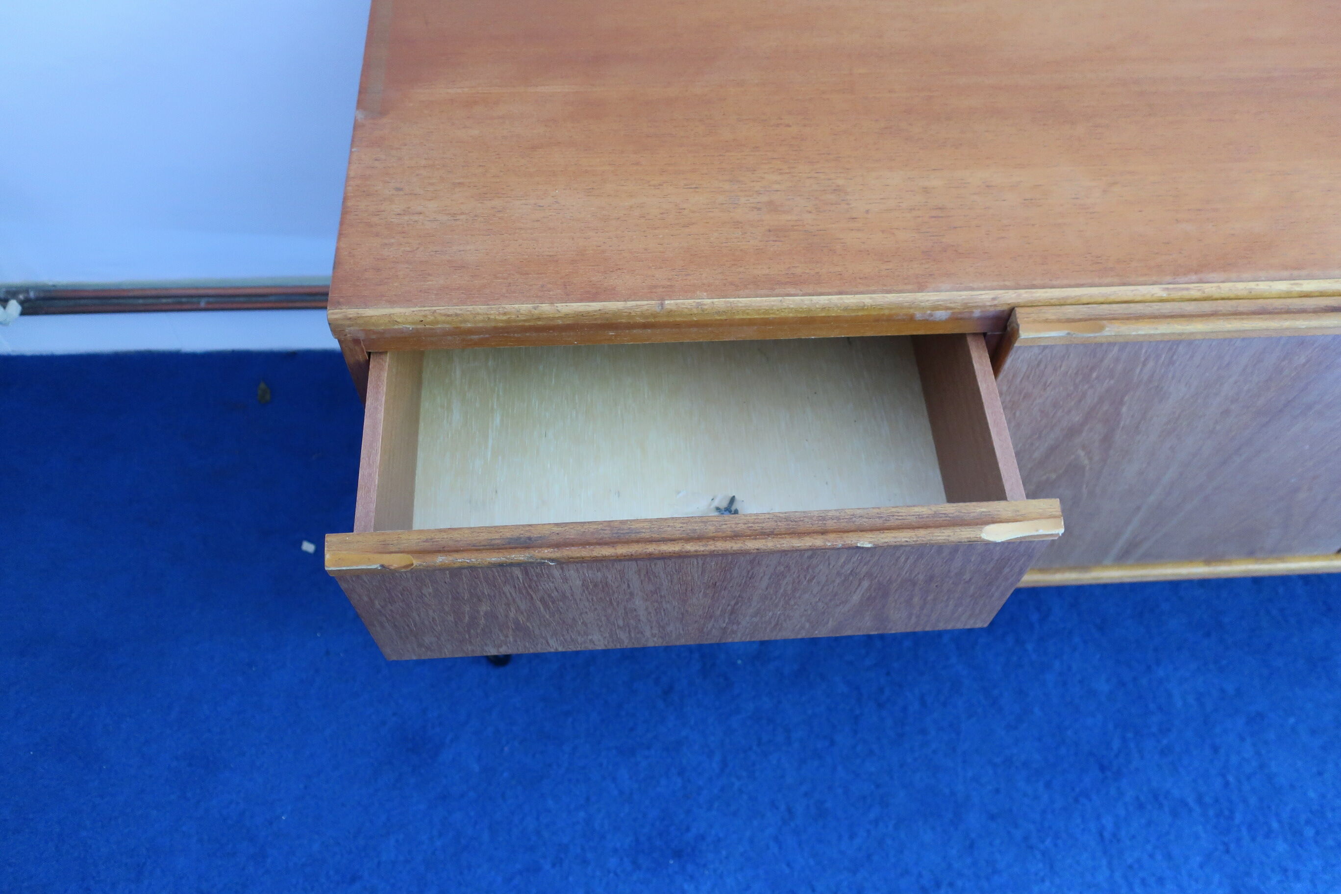 Teak sideboard from the 60s/70s pins