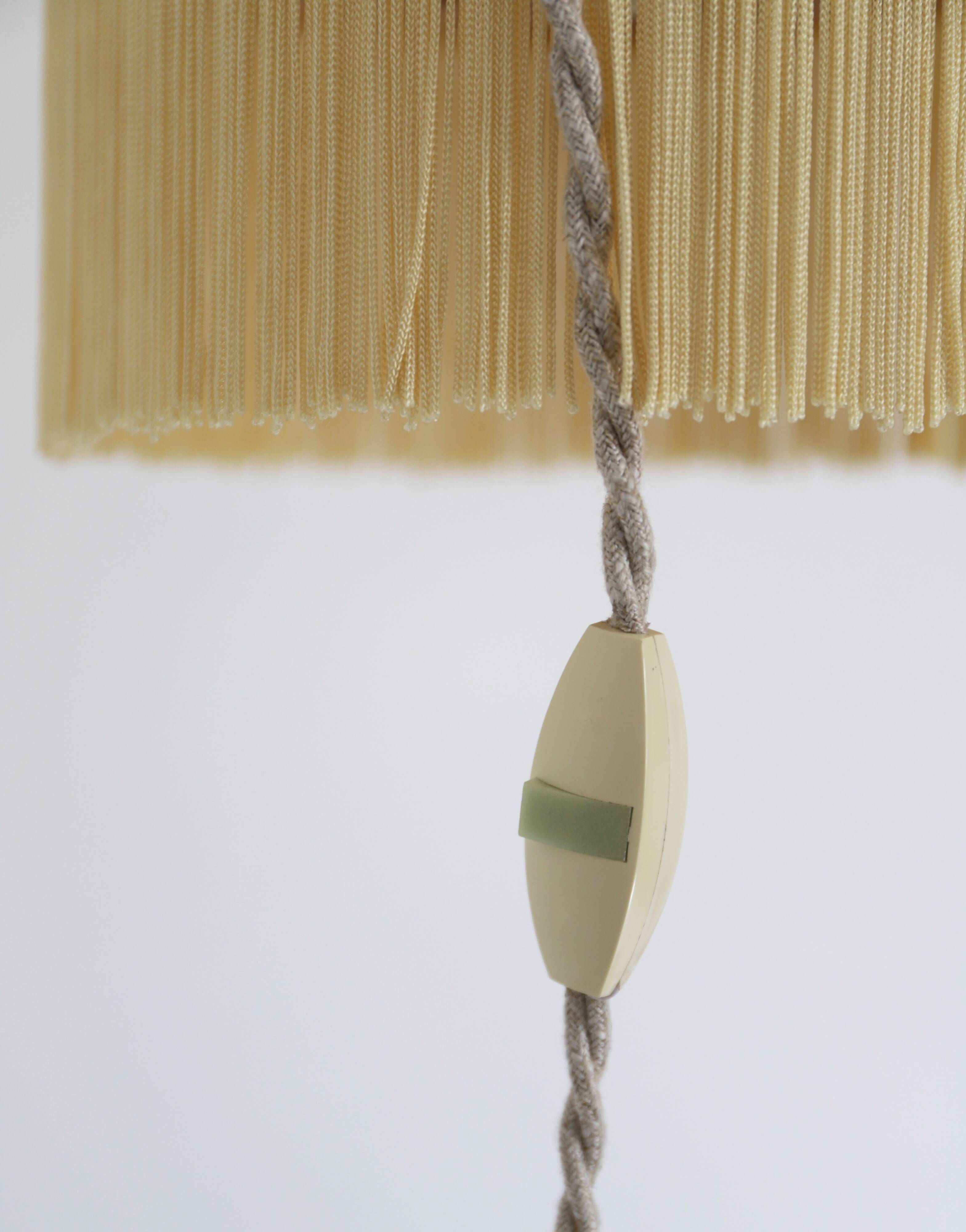 Small floral portable lamp with fringed finish