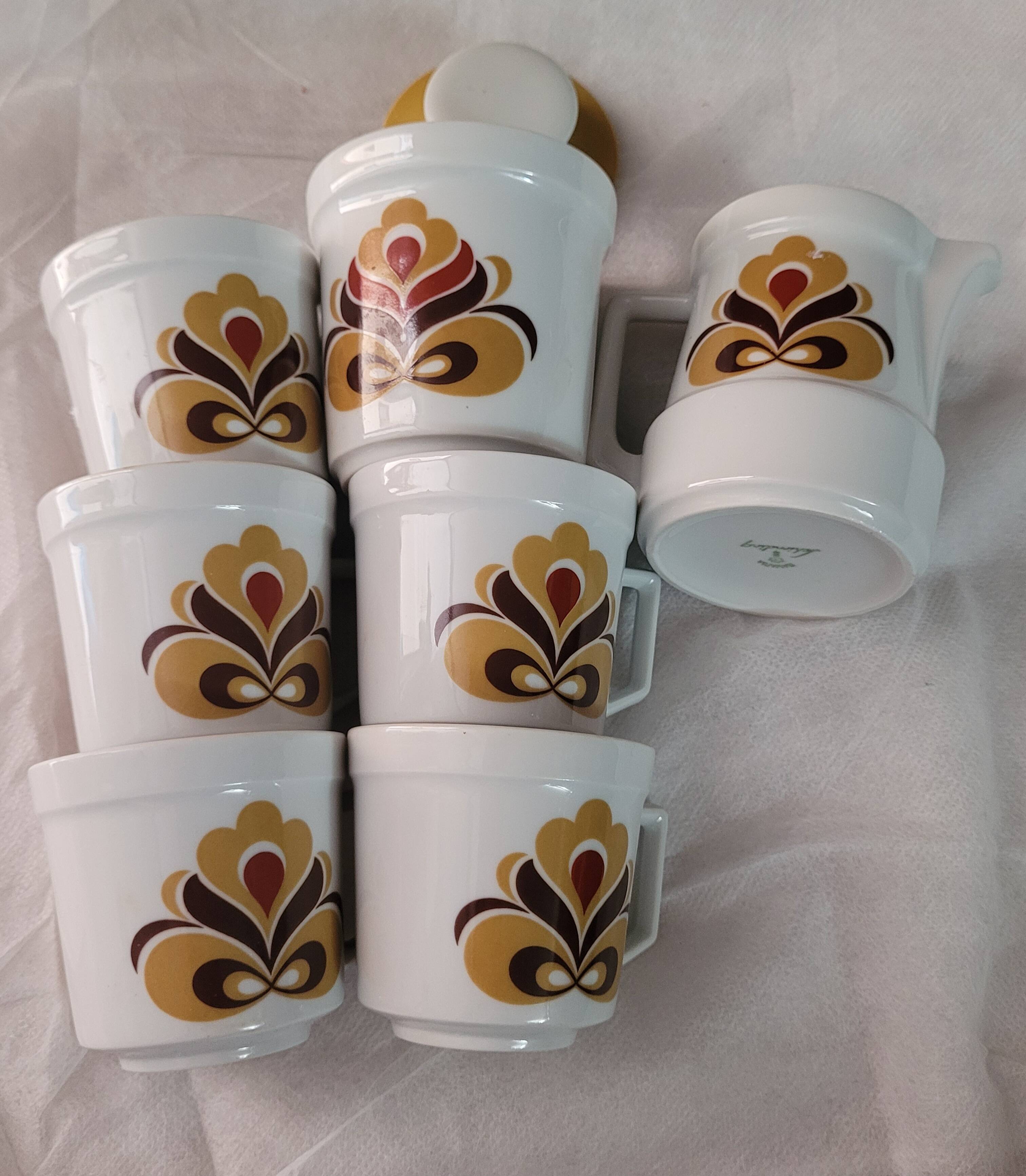 Set of coffee cups and serving pieces