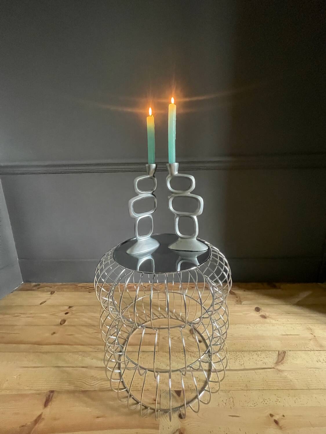 Pair of aluminum candlesticks
