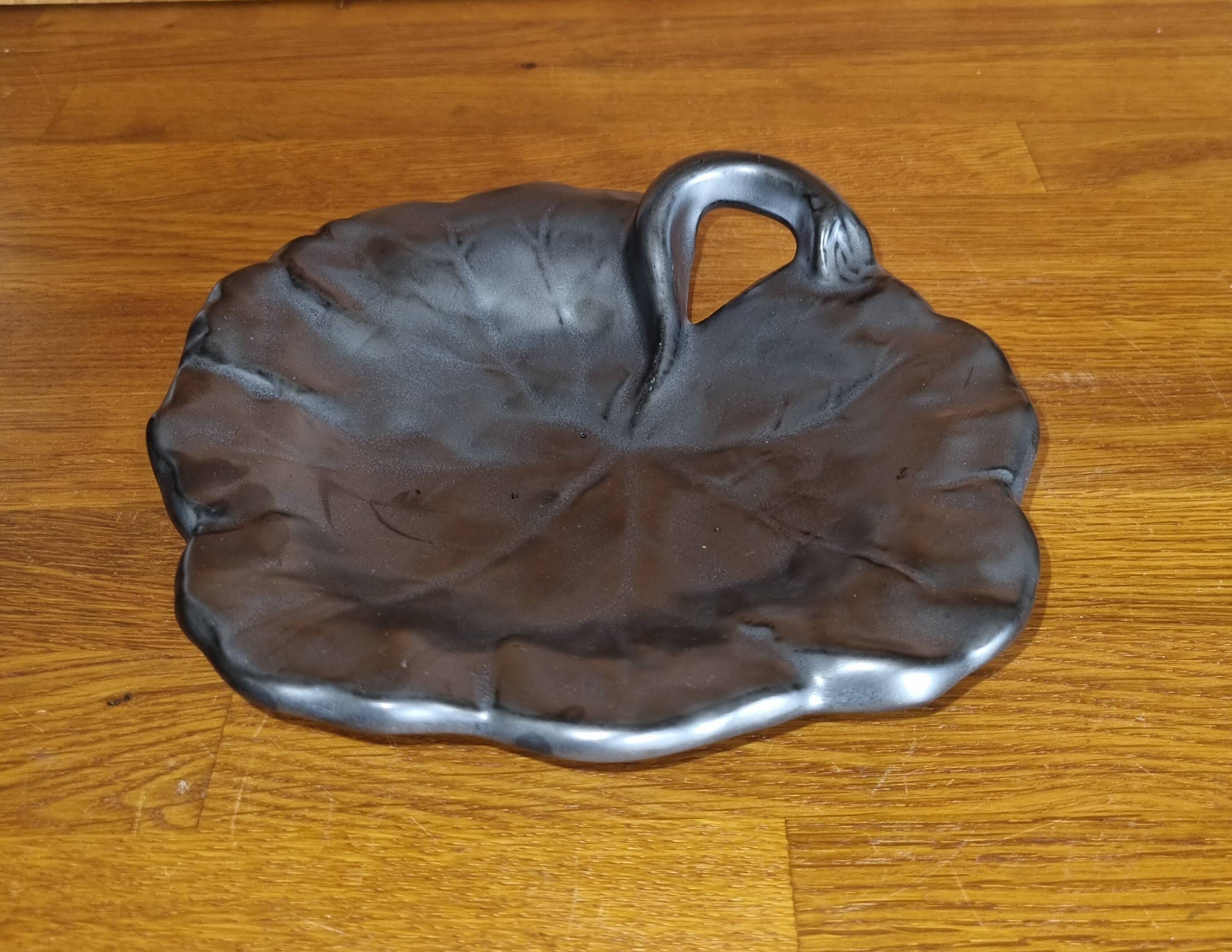 Vintage 1950s Vallauris black matte ceramic pocket bowl.