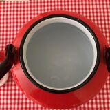 Red enameled metal teapot with chain