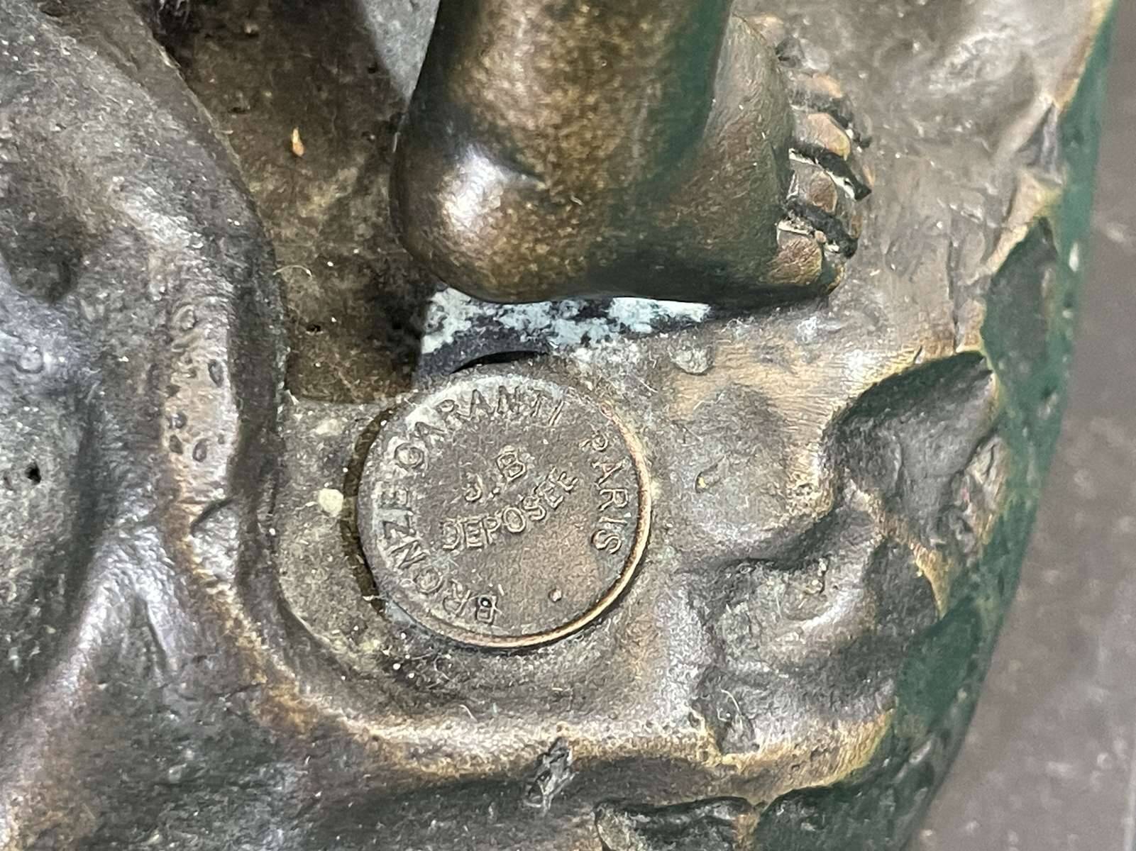 Bronze piece depicting 3 cherubs signed J. DASTE - 1950s