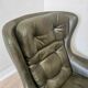 Dark green vintage leather armchair: 1970s Scandinavian style