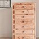 Old wooden chest of drawers raw and black wood