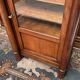 Empire style display case in cherry wood