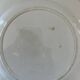 Flat earthenware plate with floral motifs