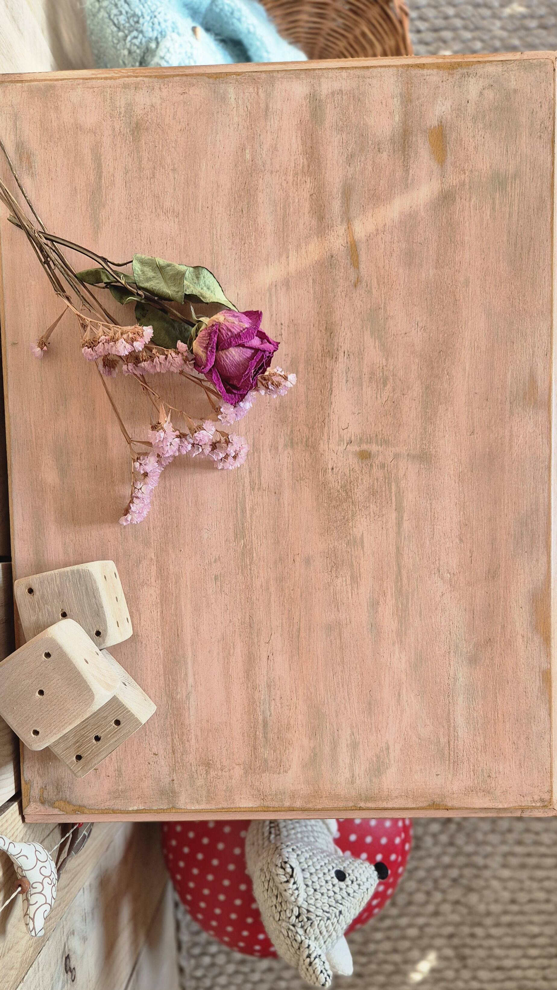 Small Parisian-style chest of drawers patinated in pink.