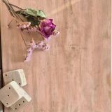 Small Parisian-style chest of drawers patinated in pink.