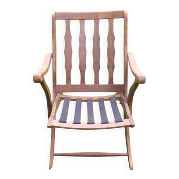 Folding wooden armchair