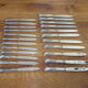 23 silver metal knives