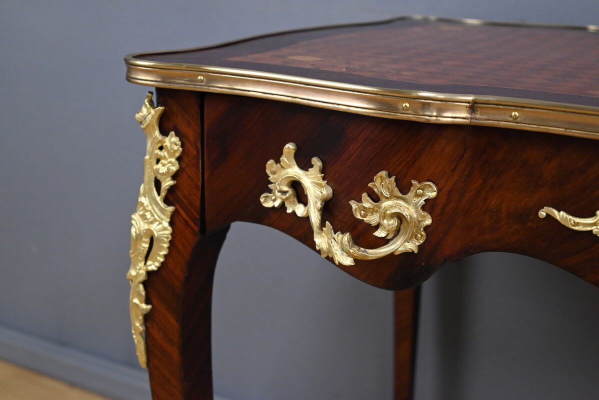 Rosewood, mahogany, and rosewood desk-table, Louis XV style – early 20th century.