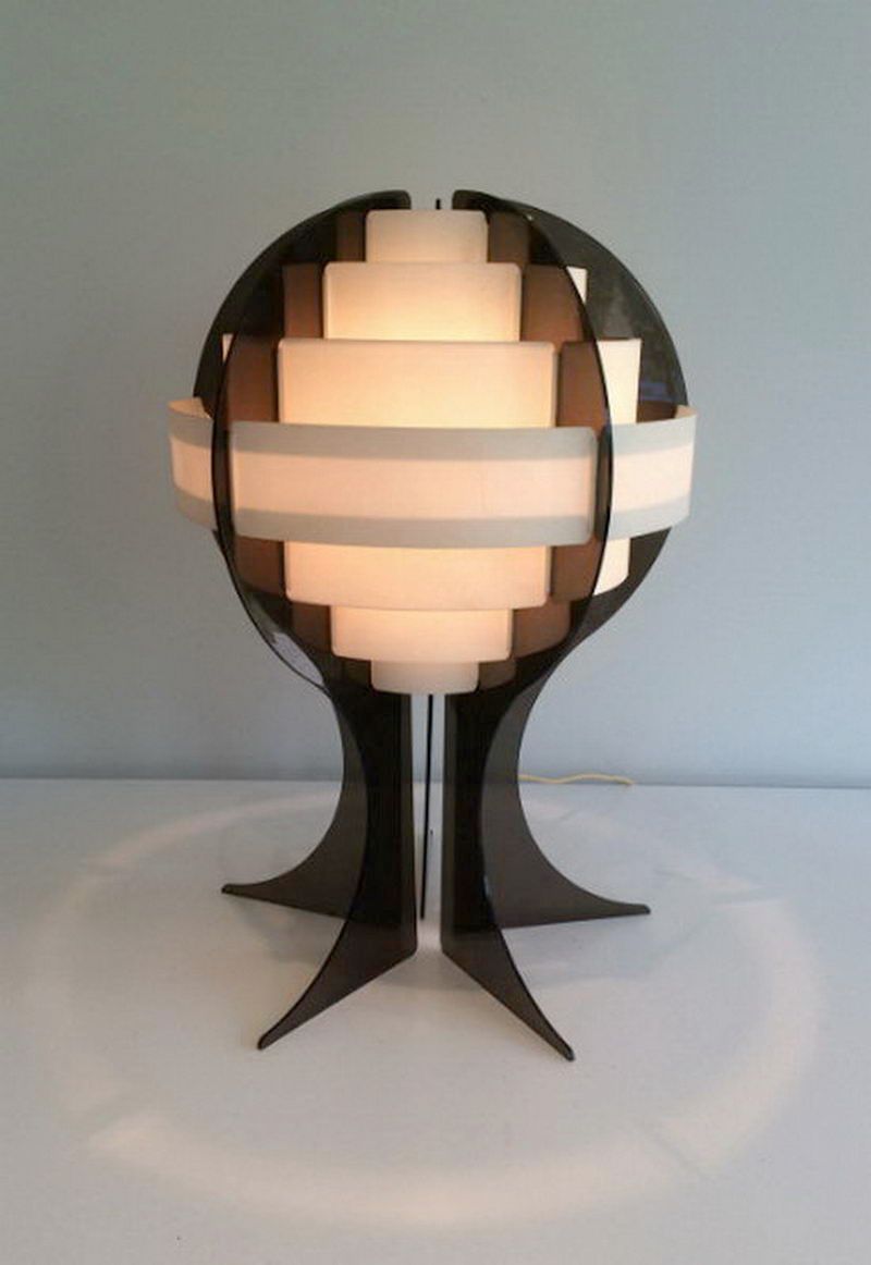 Modernist lamp in plexiglass and white plastic strips.