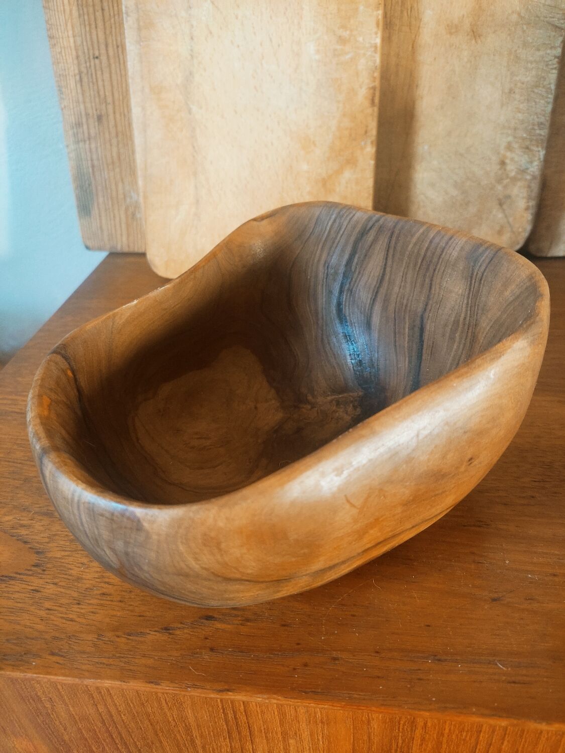 Empty pocket in olive wood