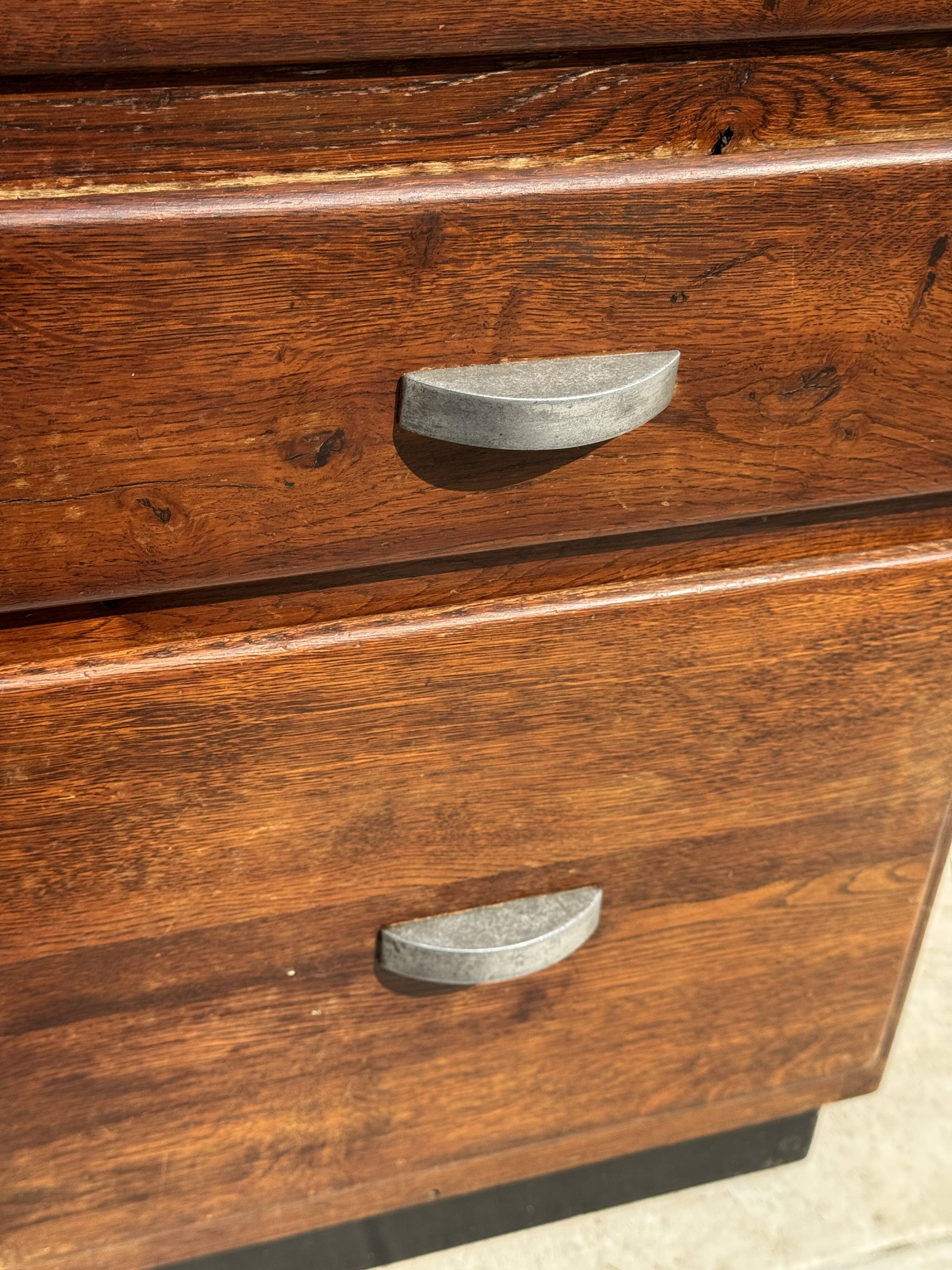 Modernist desk in wood and green moleskin upholstery