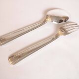 Silver plated metal service: 12 soup spoons, 12 forks and ladle.