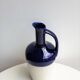 Blue and white pitcher
