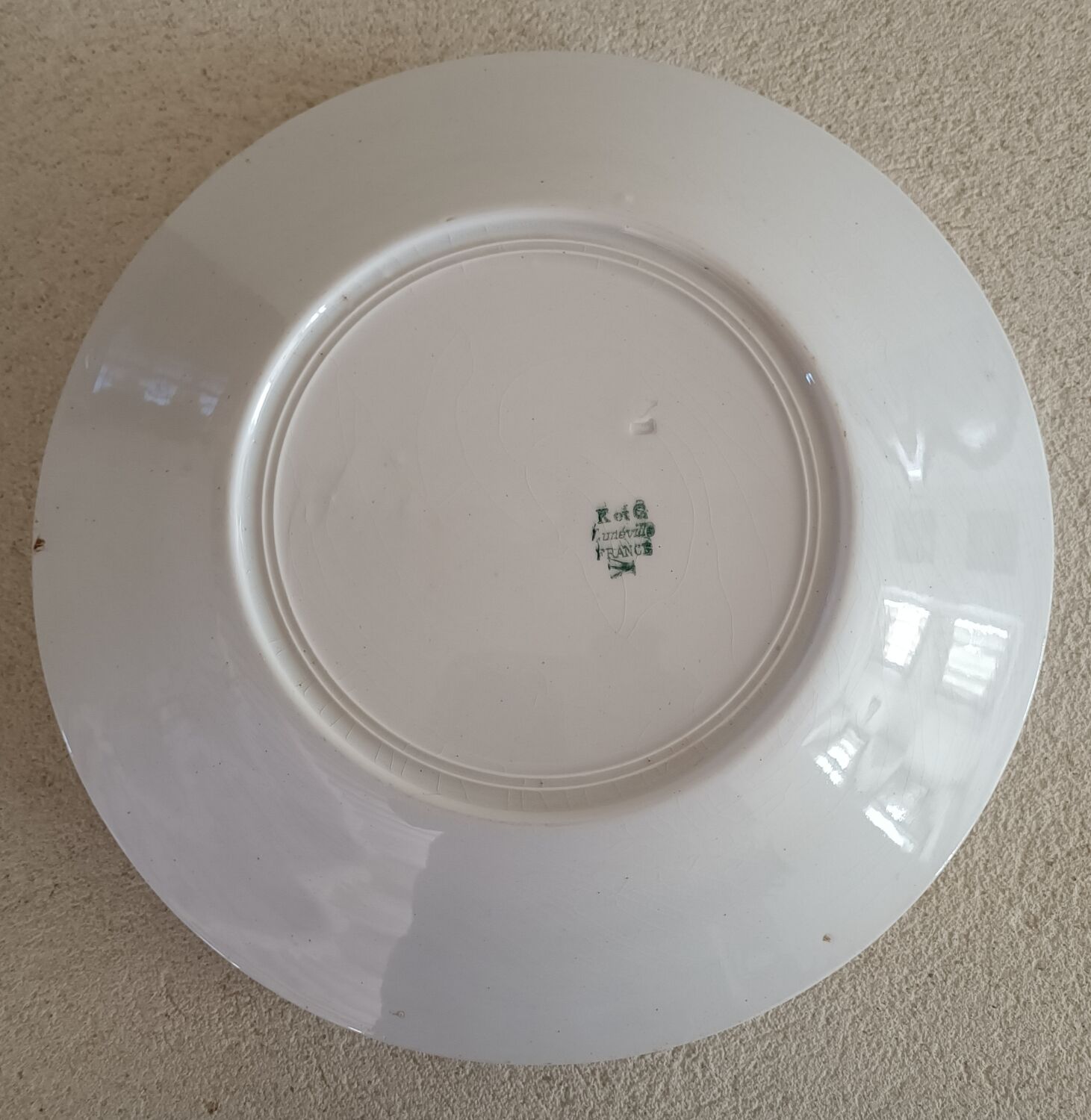 Set of five Longwy iron earth plates