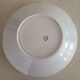 Lot de cinq assiettes terre de fer Longwy