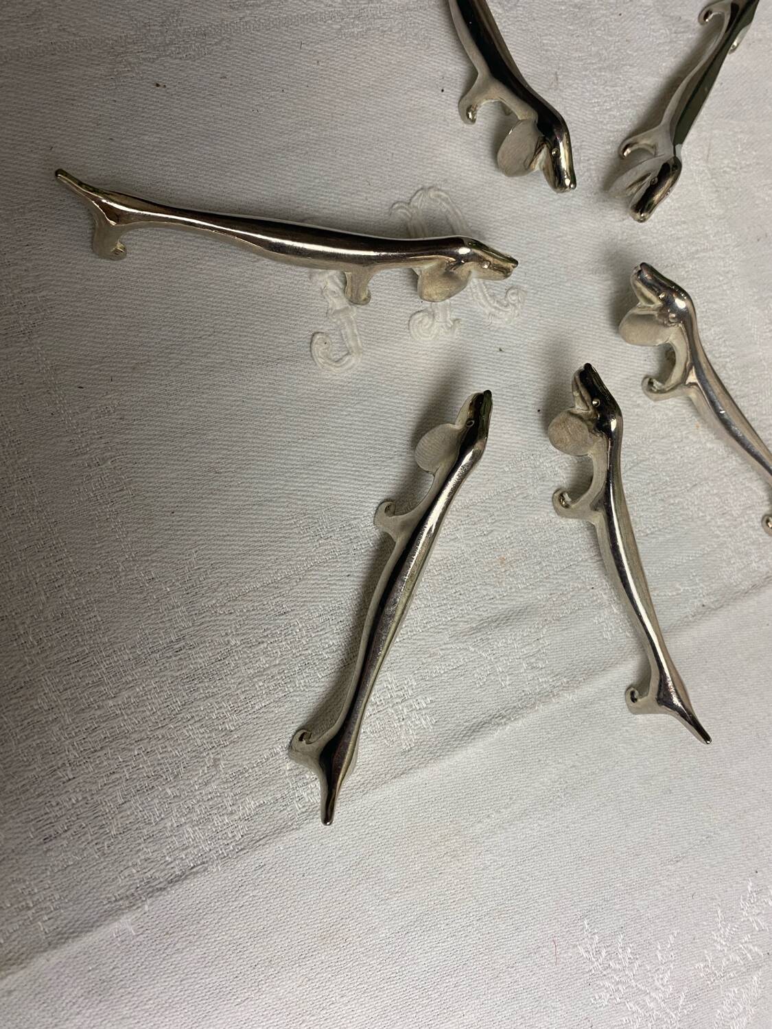 Set of 6 silver metal dachshund knife rests