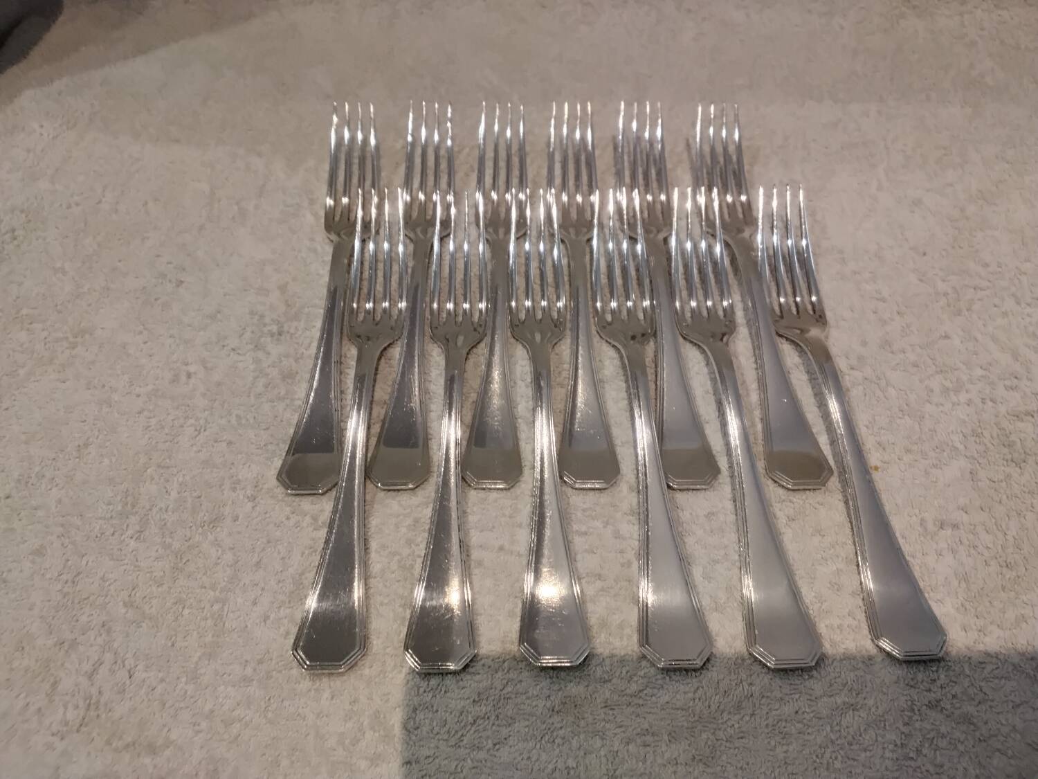 12 silver-plated table forks by Christofle America