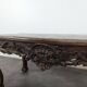 Louis XV coffee table in carved walnut with a gilded leather top.