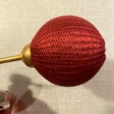 Red crystal perfume spray and red pump.