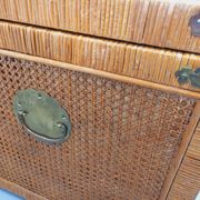 Vintage trunk in wood, rattan, caning, and brass.