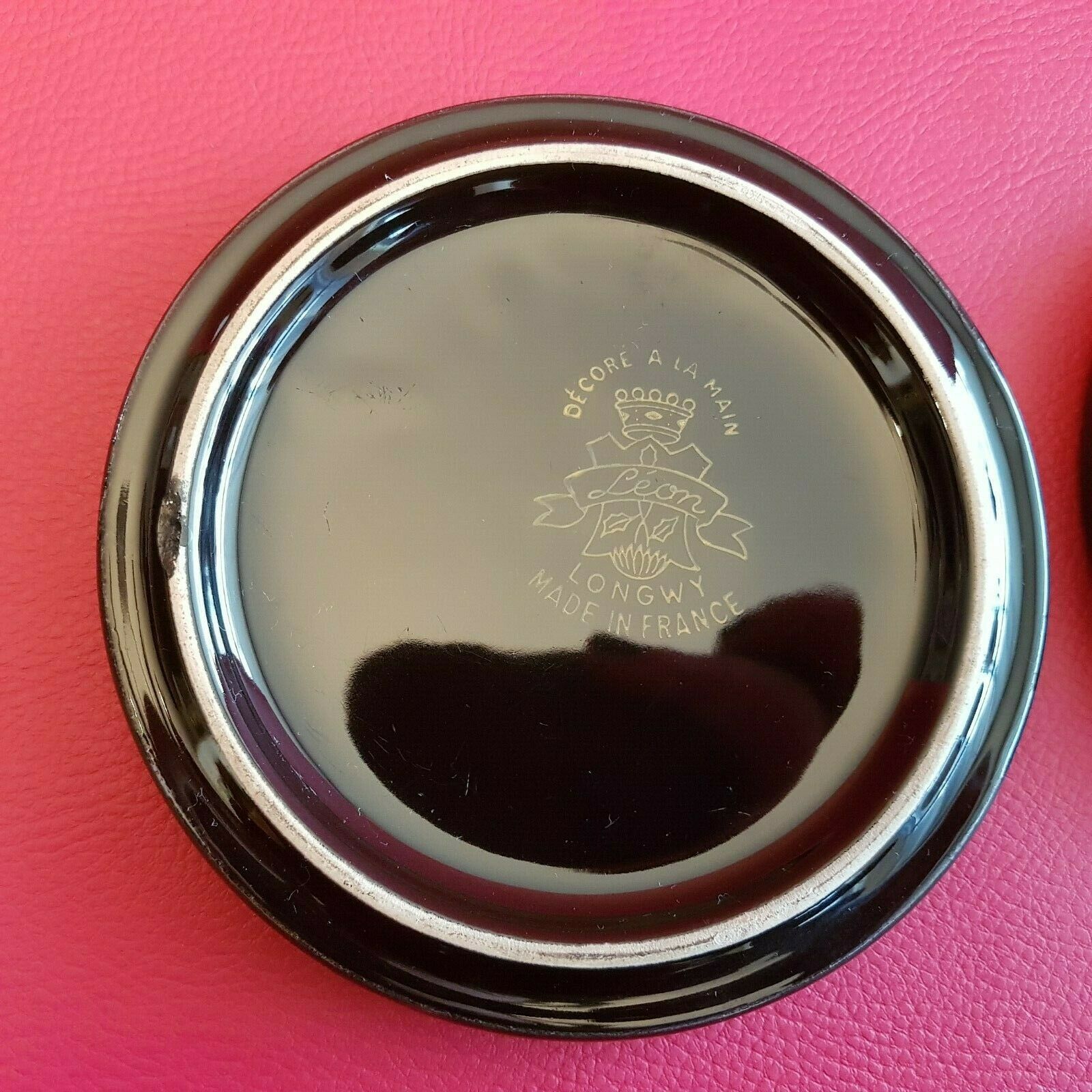 Pair of bottle bottoms  Leon Longwy