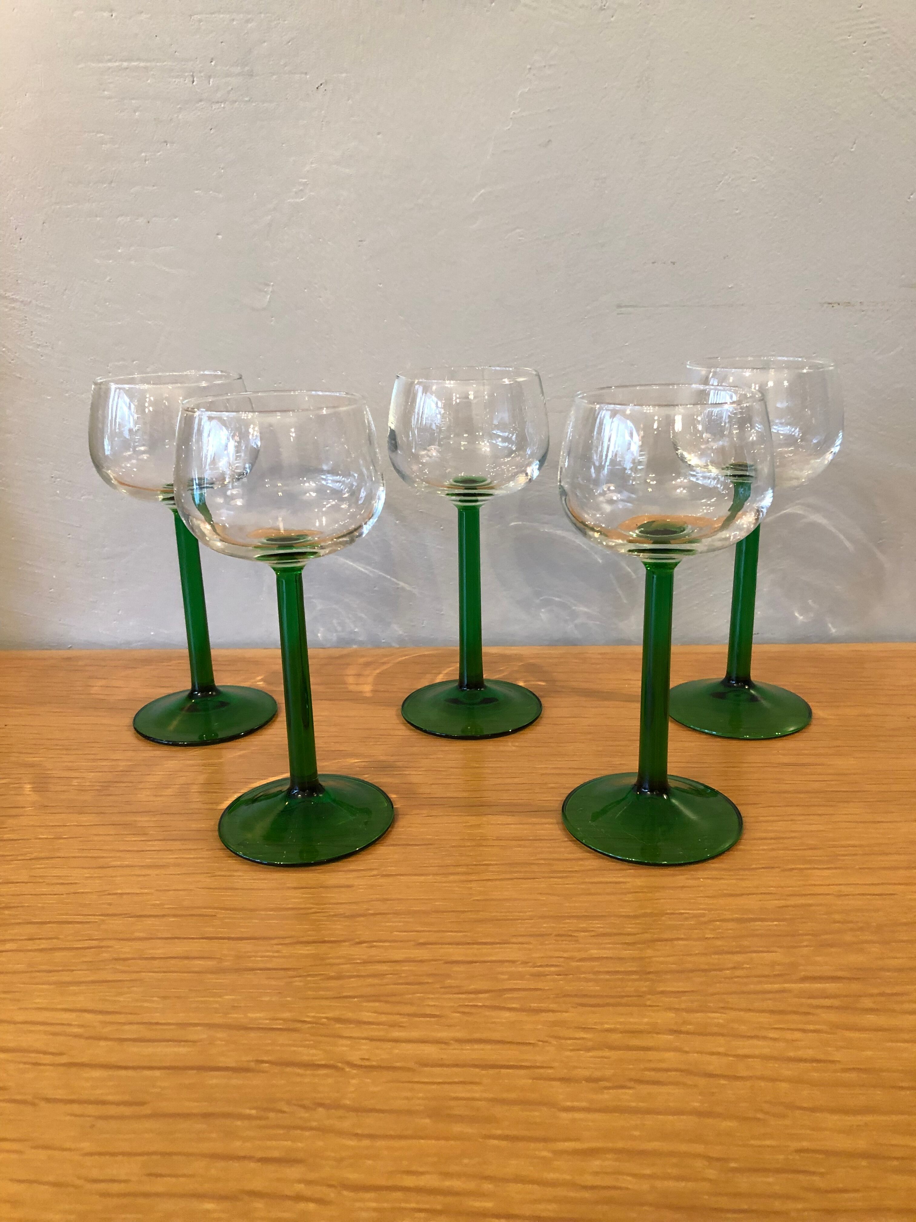 5 old white wine glasses