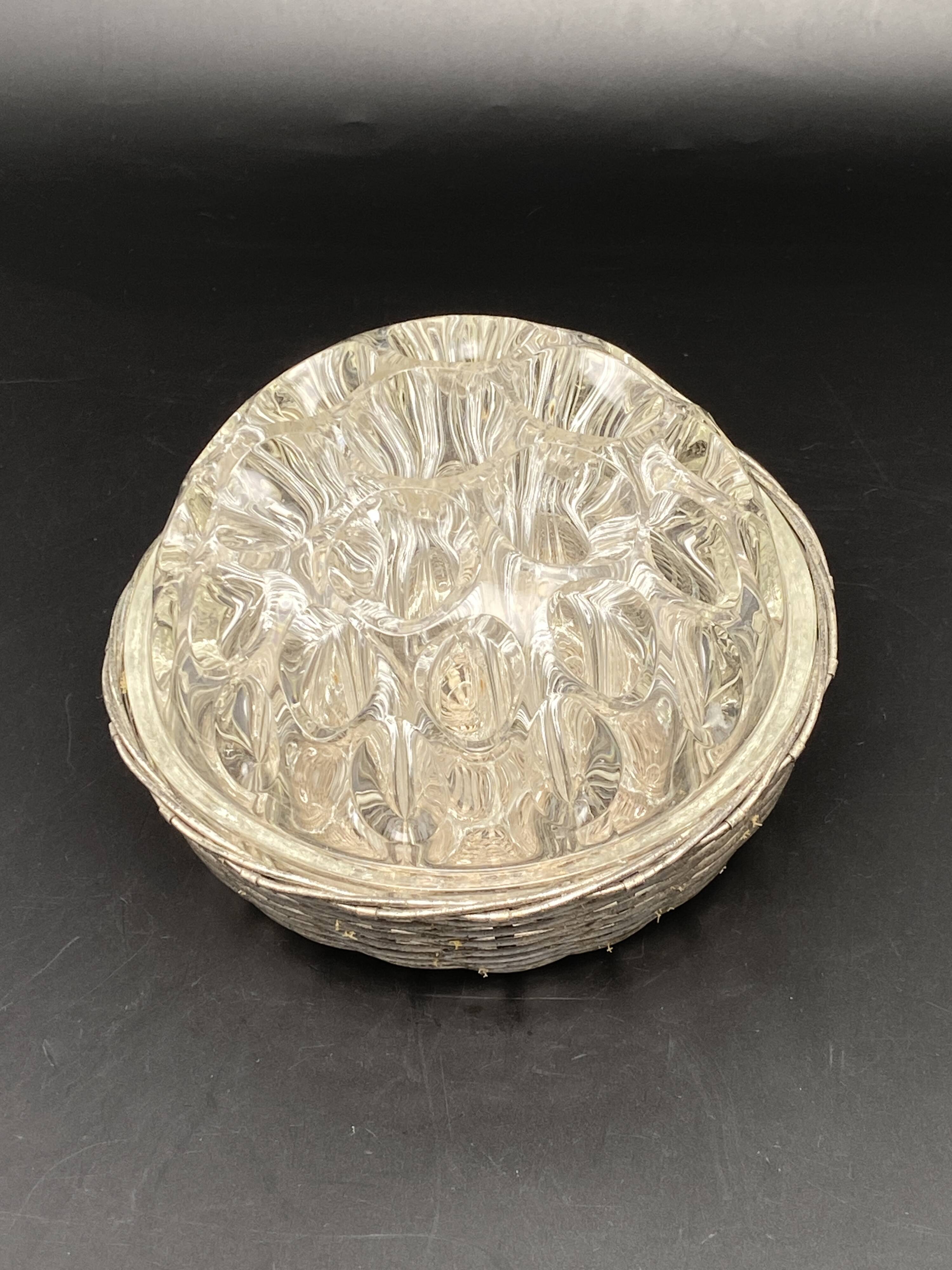 Glass flower stand with woven metal support