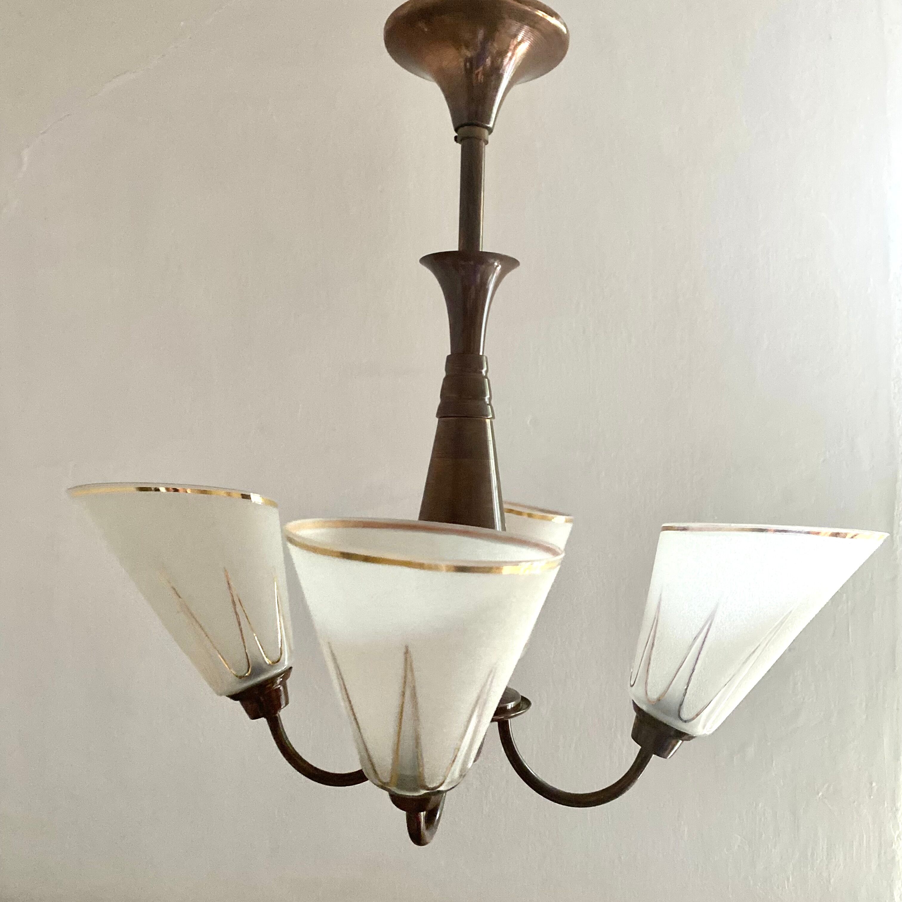 Art deco chandelier in copper and granite glass